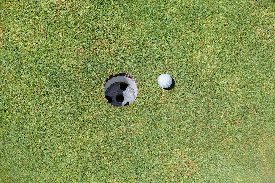 Golf Ball Next To The Hole Photograph by Tuan Tran
