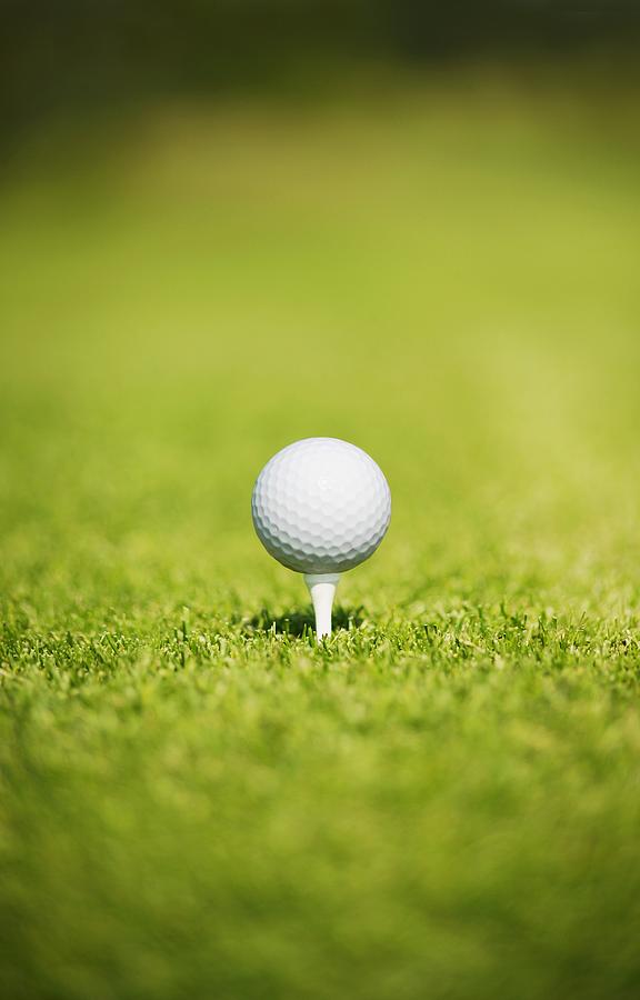 Golf Photograph - Golf Ball On A Tee by Darren Greenwood