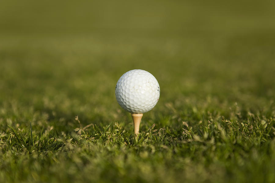 Golf ball on a tee Photograph by Patrick Strattner