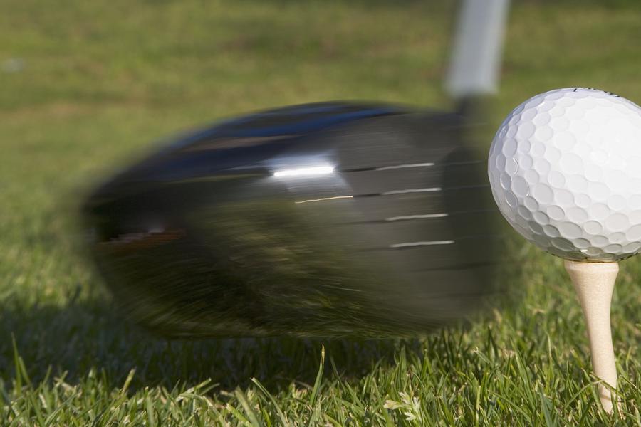 Ball Photograph - Golf Ball On Tee Hit By Driver by Ken Welsh