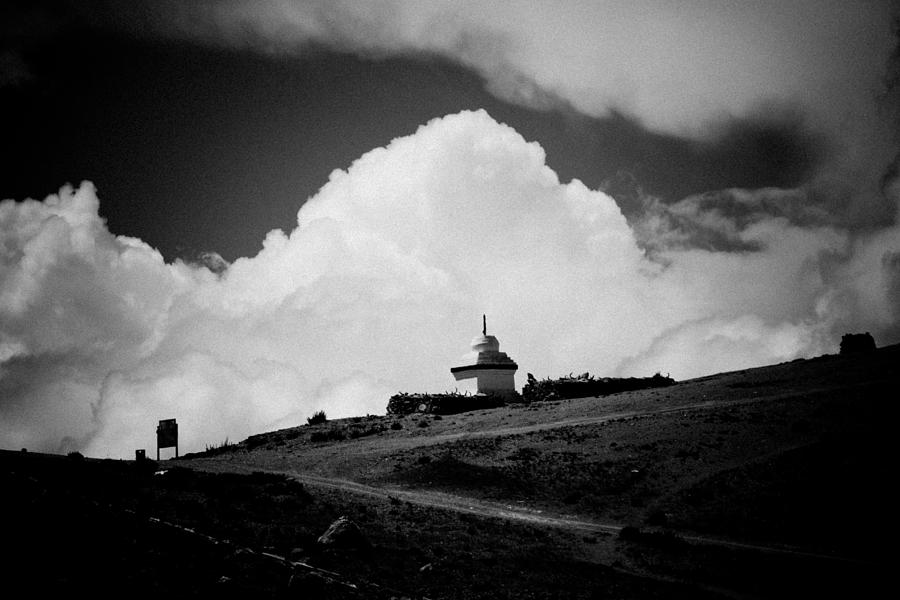 Gompa clouds in Tibet  Photograph by Raimond Klavins