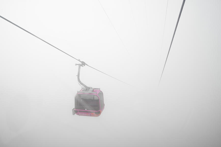 Gondola cable car in the fog Photograph by Matthias Hauser
