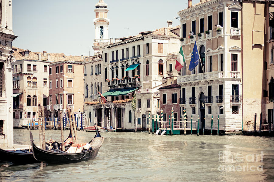 Gondola on the grand canal by Rialto Bridge in Venice Italy Photograph by Raimond Klavins