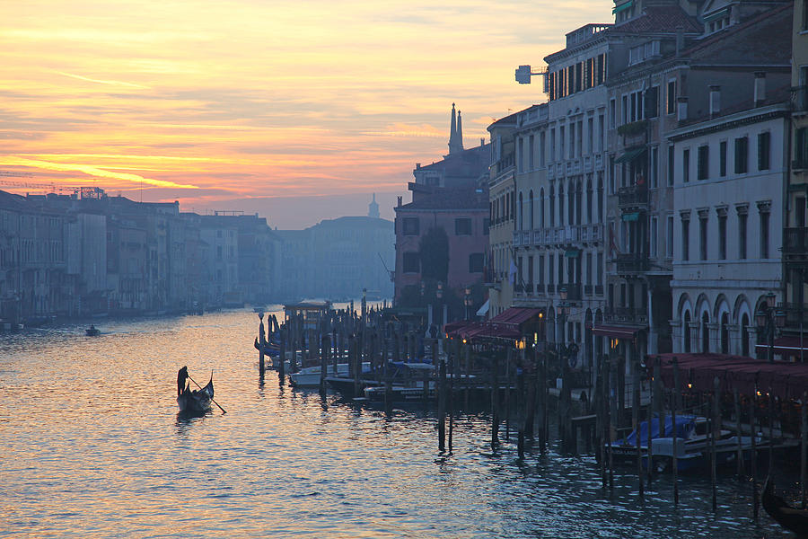Gondolas on the Grand Canal Venice at sunset Photograph by John Keates