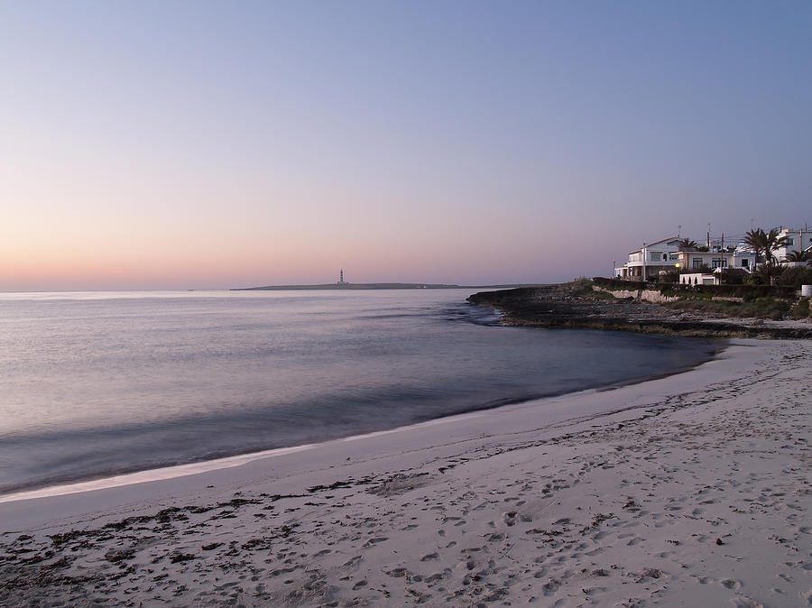 Dusk at Punta prima beach and Isla del Aire lighthouse - Good morning sunshine Photograph by Pedro Cardona Llambias