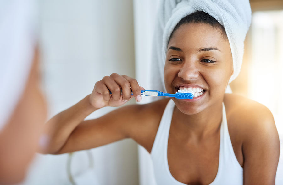 Good oral hygiene begins every morning Photograph by Peopleimages