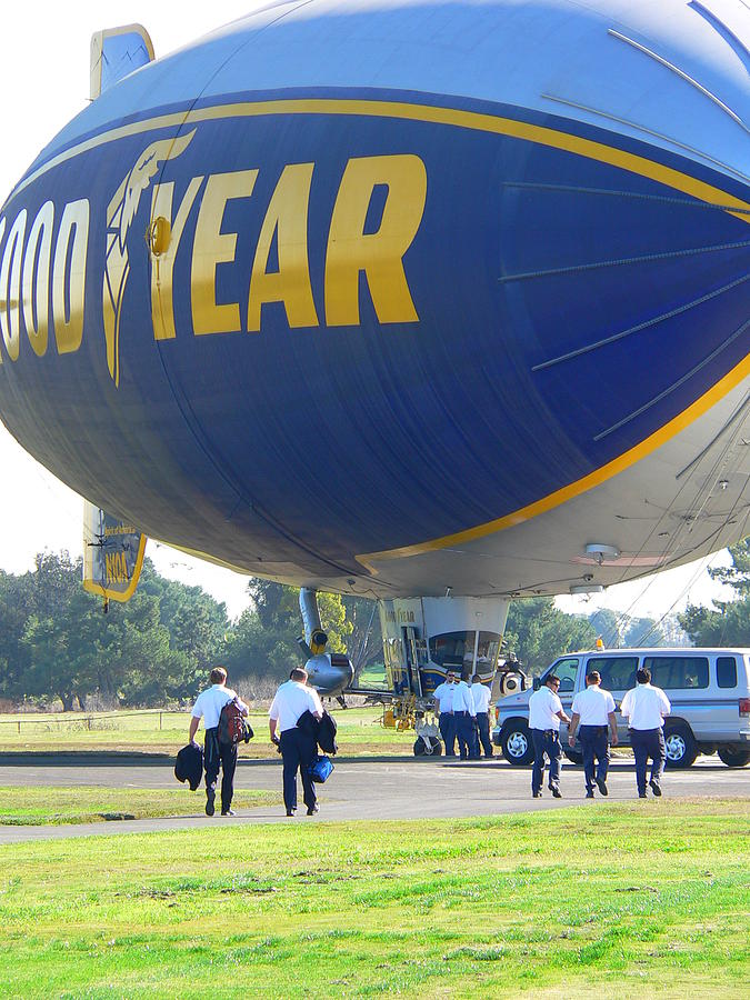 Goodyear Blimp Pilots and Crew Photograph by Jeff Lowe