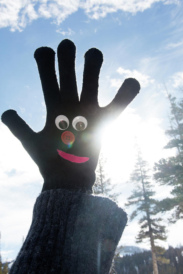 Santa Monica Photograph - Googly Eyed Smiley Face On Black Glove by Mimi Haddon