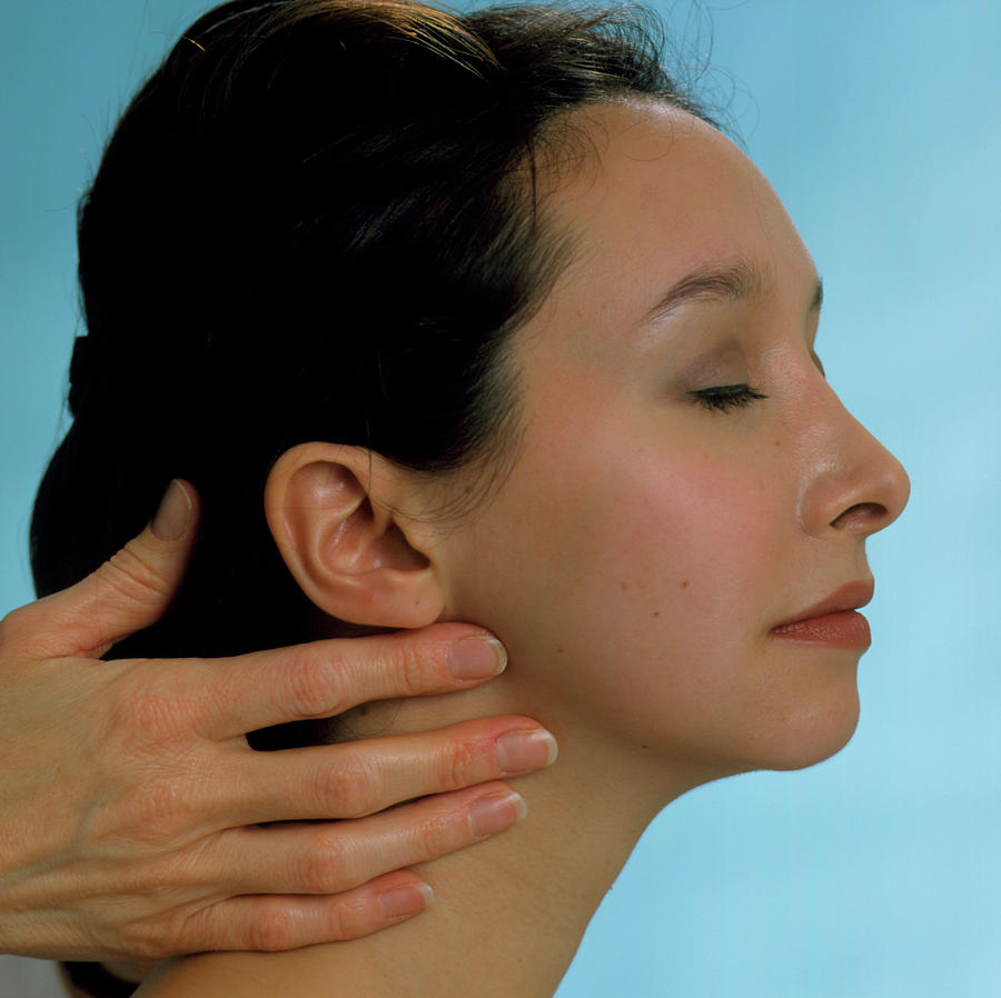 Gp Palpating The Lymph Glands Of A Young Woman Photograph By Saturn 