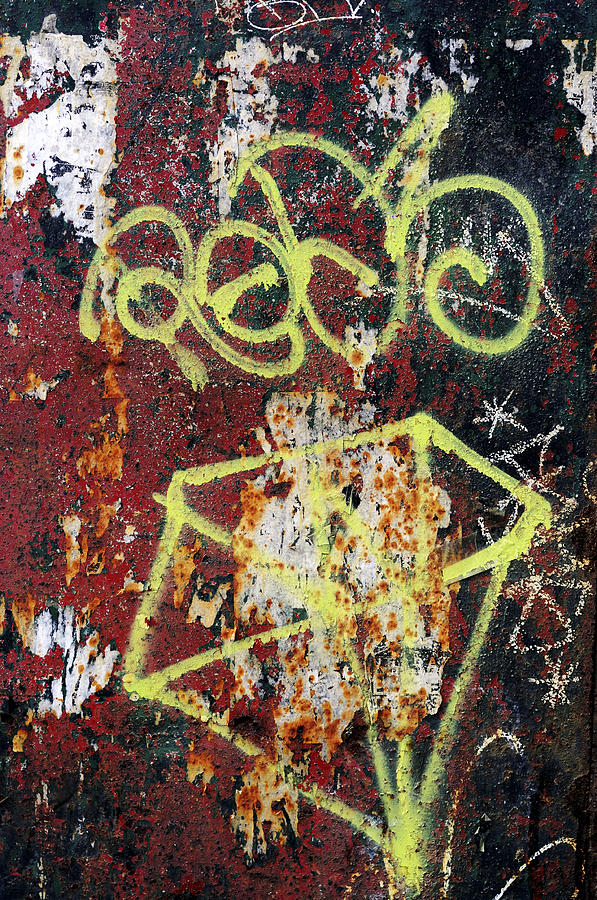 Graffiti On Rusted Door Photograph by Norman Pogson