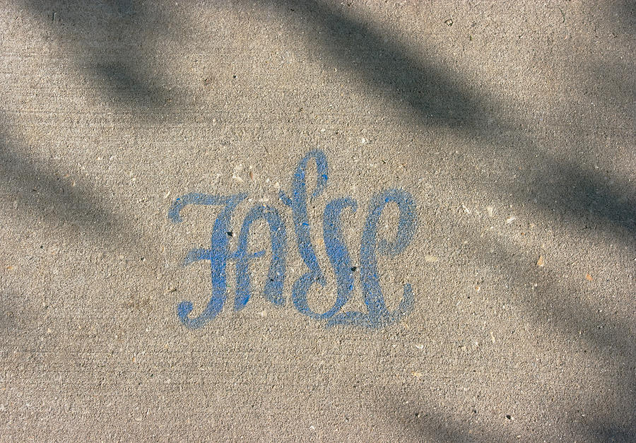 Graffiti Of False In Blue Photograph