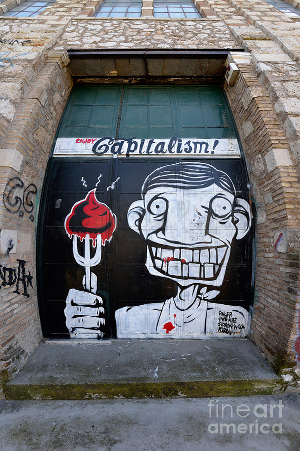 Graffiti on a door Photograph by George Atsametakis