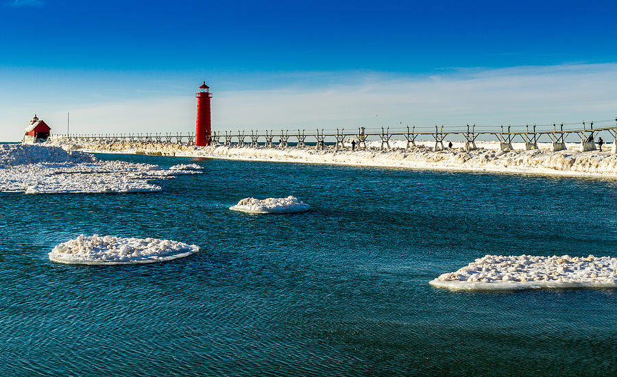 Grand Haven Lighthouse Tip of the iceberg Photograph by Joe Holley