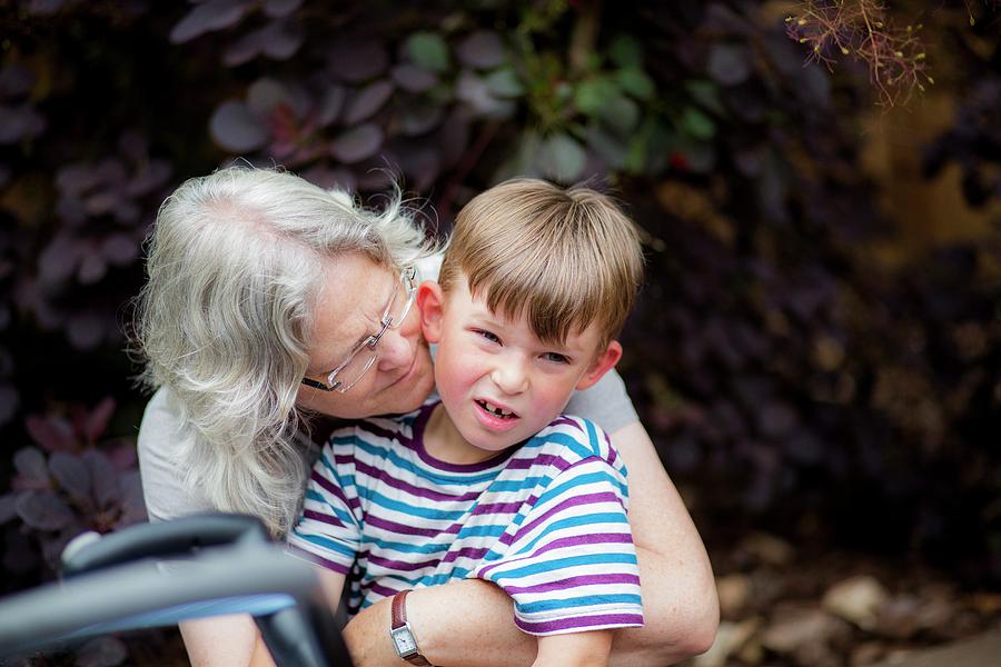 Two People Photograph - Grandmother Hugging Grandson by Samuel Ashfield