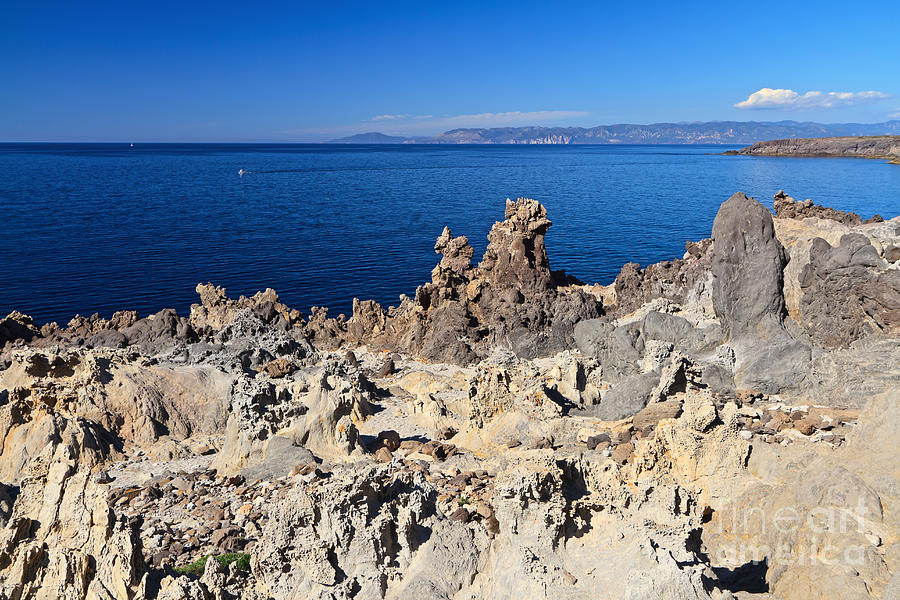 granite cliff in Carloforte island Photograph by Antonio Scarpi