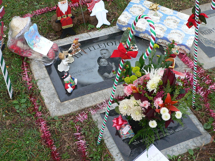 Grave at Christmas Photograph by Jeff Lowe