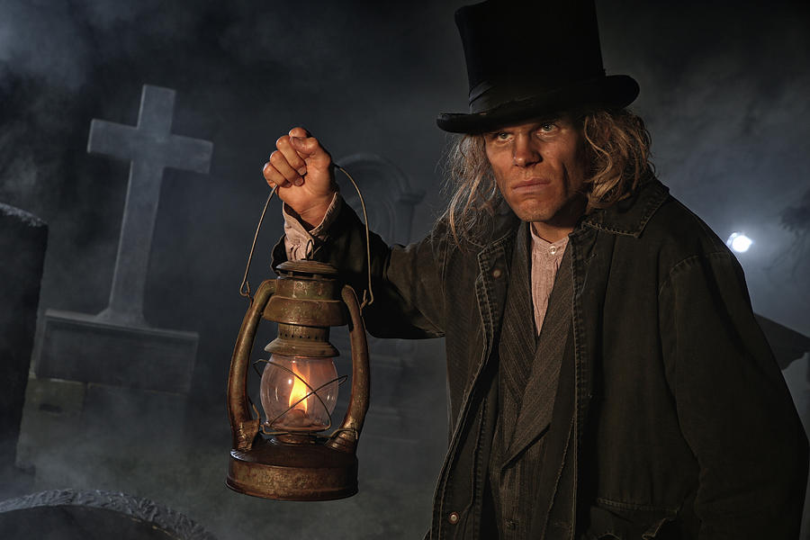 Grave digger with lantern Photograph by Jay P. Morgan