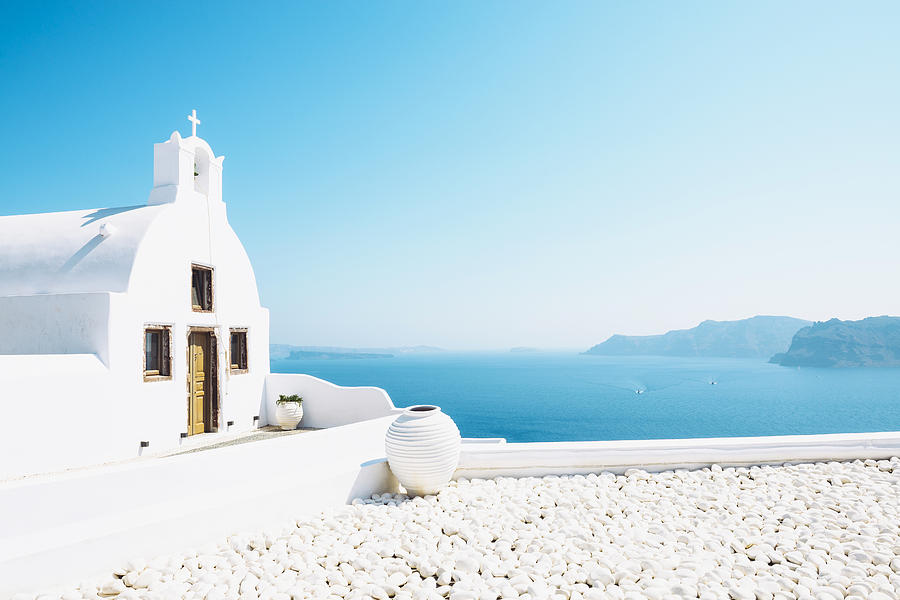 Greece, Santorini, Oia, Byzantine Orthodox church over the sea Photograph by Westend61