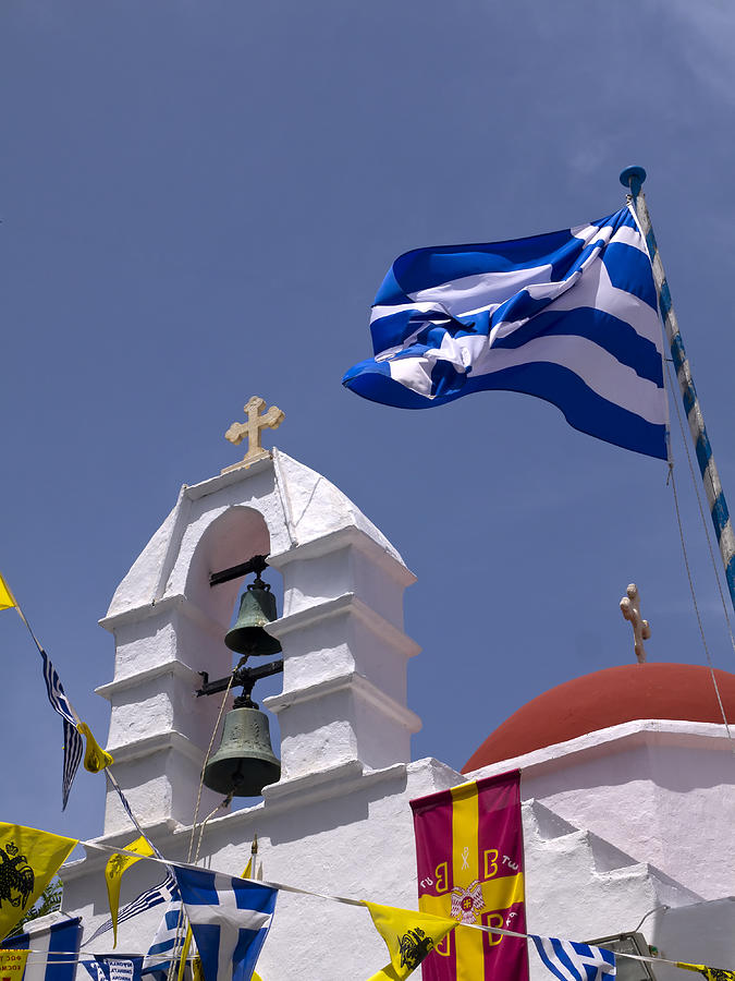 Greek church and flags Photograph by Brenda Kean