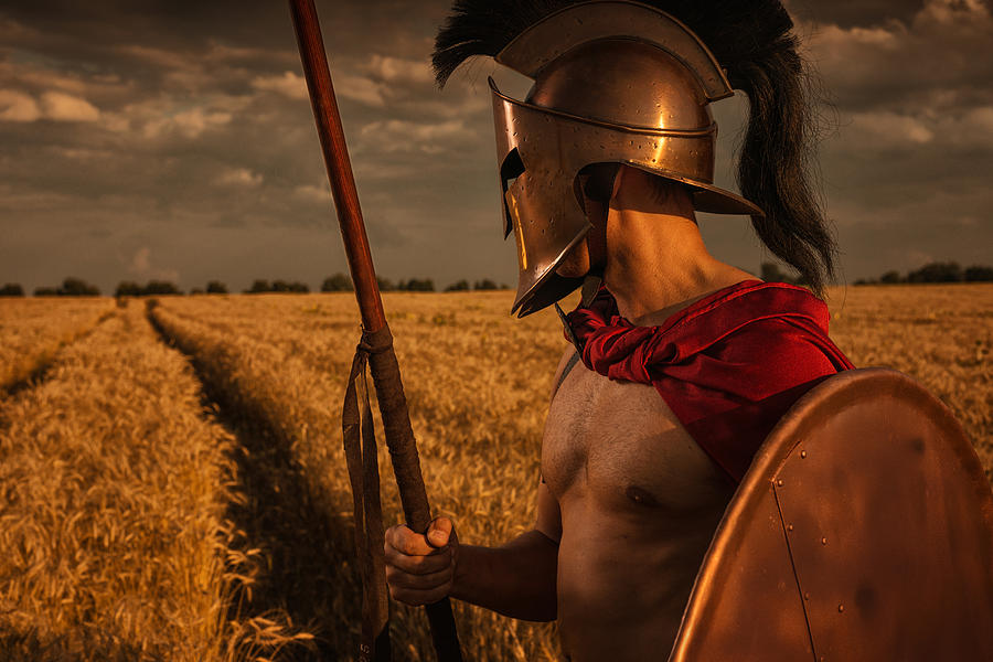 Greek warrior in wheat field Photograph by Anton Violin