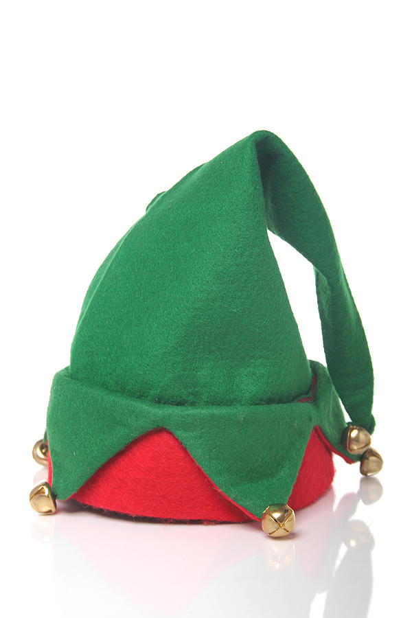 Green and red elf hat with bells with a white background Photograph by Sadeugra