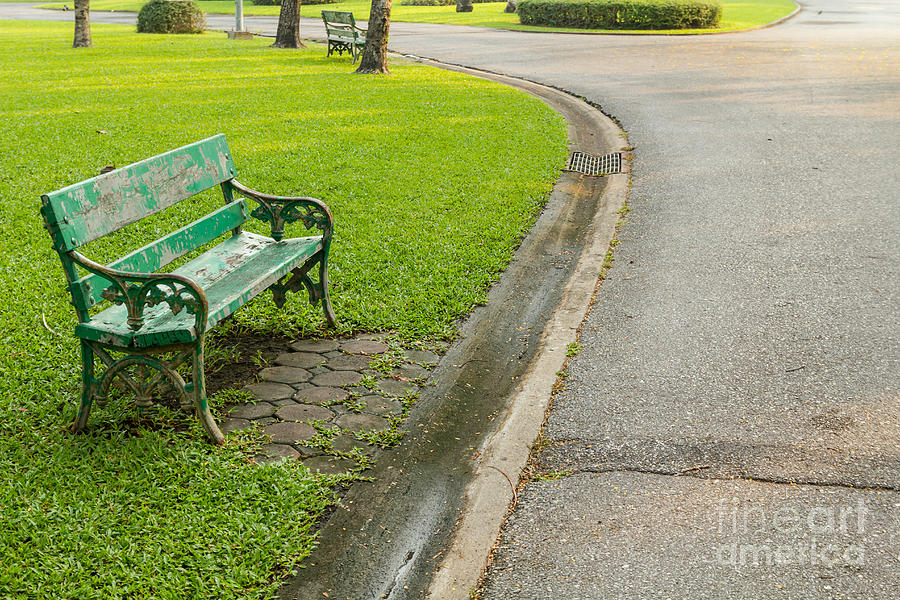 Nobody Photograph - Green bench in the park by Tosporn Preede