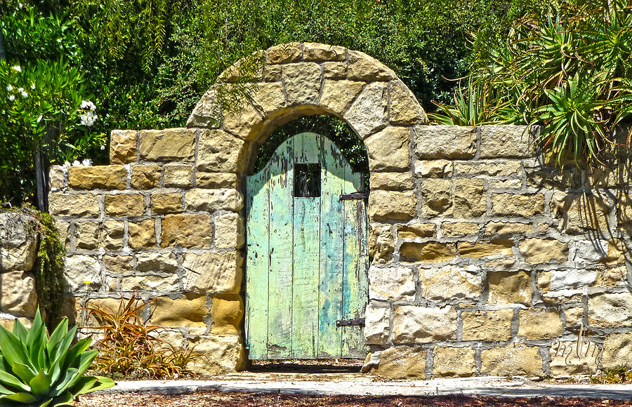 Green Door With Stones Photograph by Marie Morrisroe