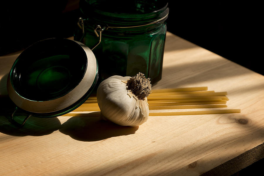 Green Glass And Garlic Photograph