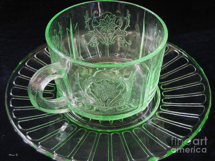 Green glass Cup and Saucer Photograph by Nina Silver