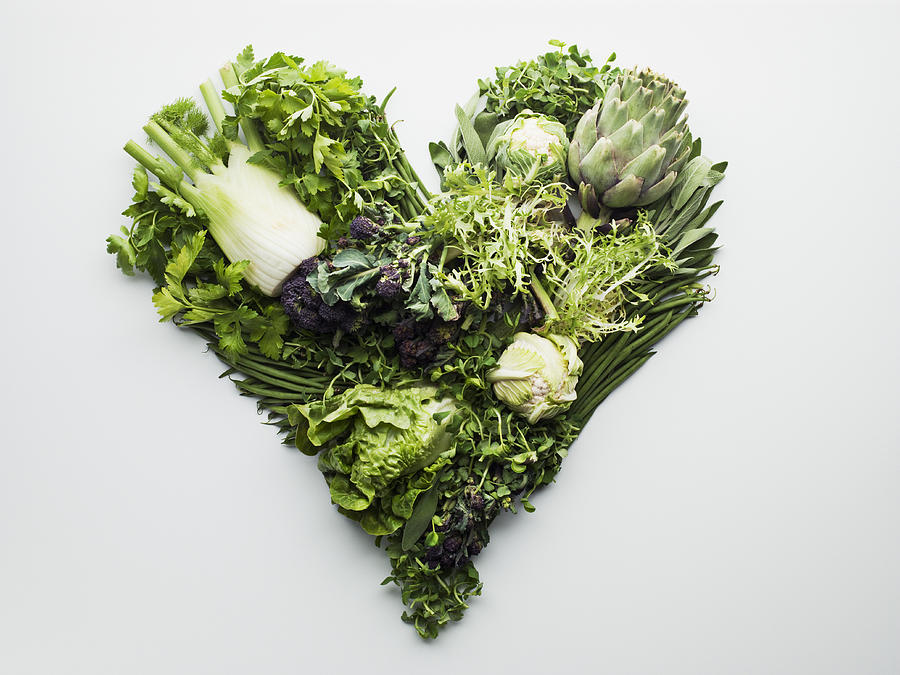 Green vegetables forming heart-shape Photograph by Martin Barraud
