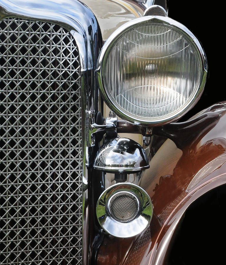 Grill and Headlight Photograph by Dave Mills