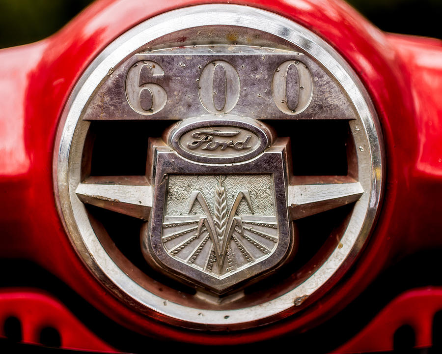 Grill logo detail - 1950s-Vintage Ford 601 Workmaster Tractor Photograph by Jon Woodhams