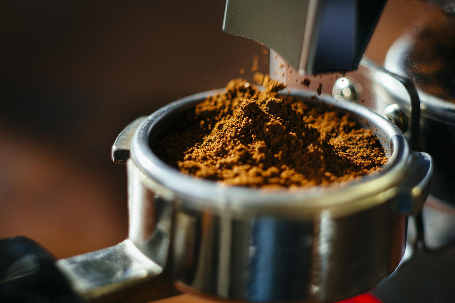 Grinding fresh espresso beans. Photograph by Guido Mieth