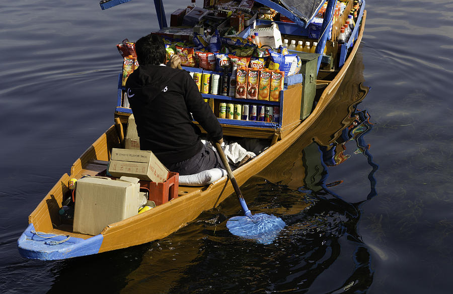 Juice Photograph - Groceries at your doorstep - Grociers on a shikara on the Dal Lake by Ashish Agarwal