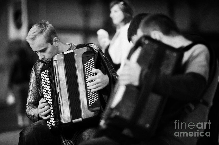 City Photograph - Group Of Accordion Players During Street Performance In Rynek Glowny Town Square Krakow by Joe Fox