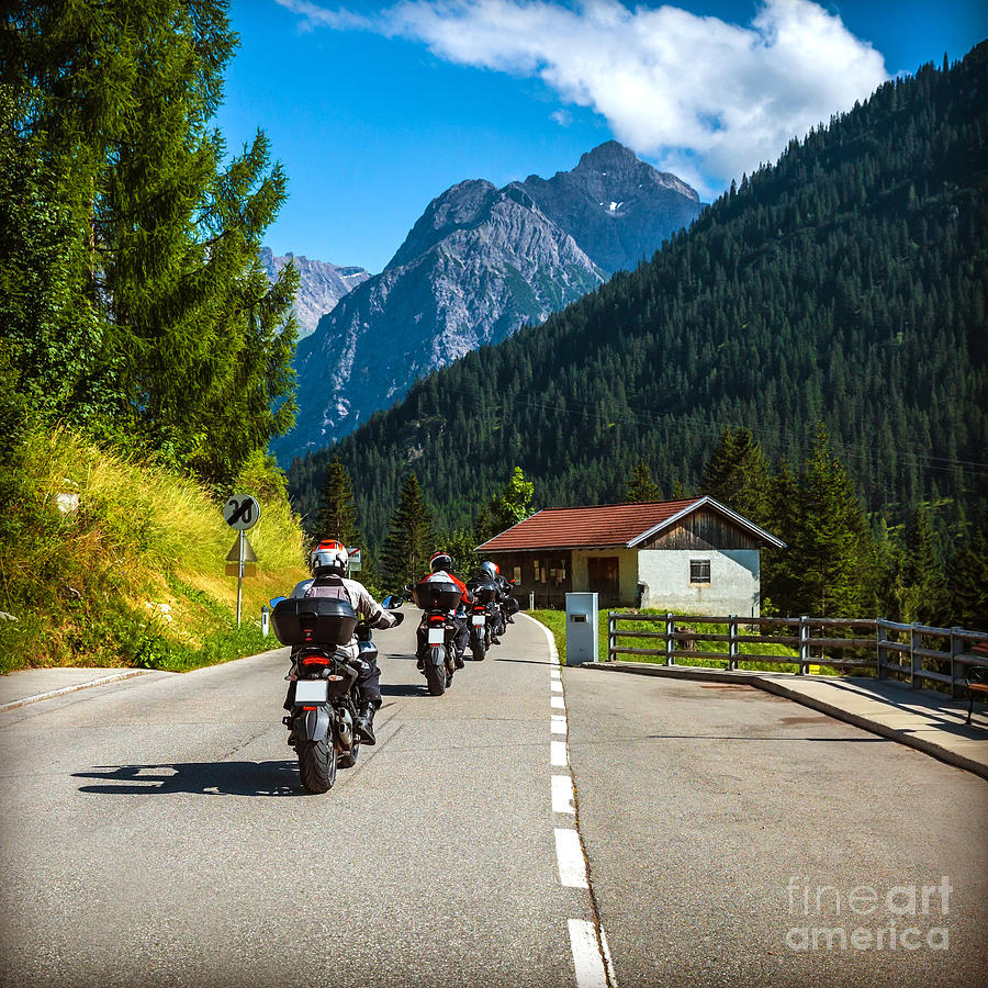 Group of bikers on the road in Alps Photograph by Anna Om