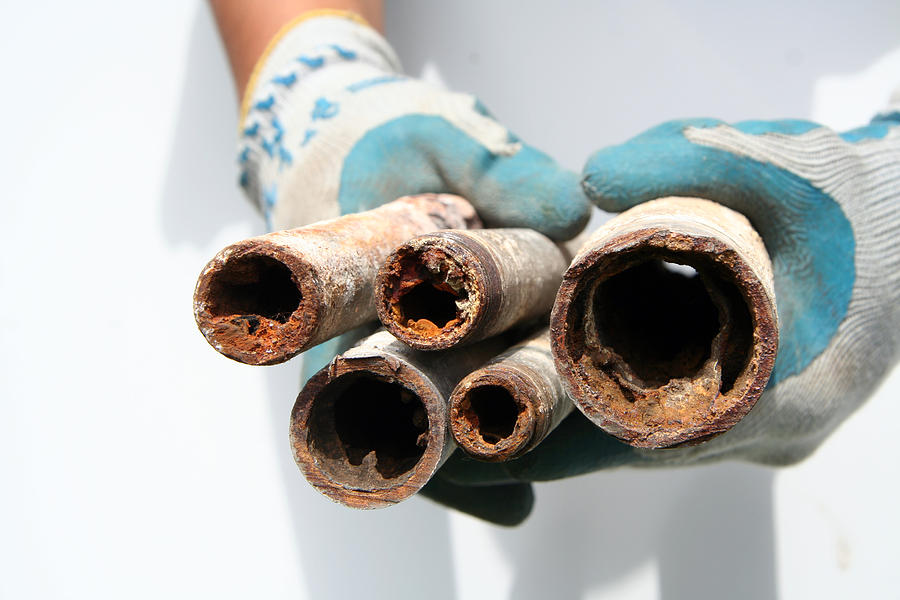 Group of dirty pipes Photograph by Chimmy
