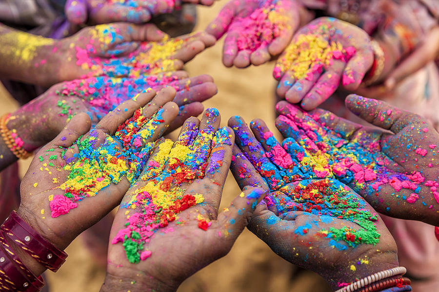 Group of Indian children playing holi in Rajasthan, India Photograph by Bartosz Hadyniak