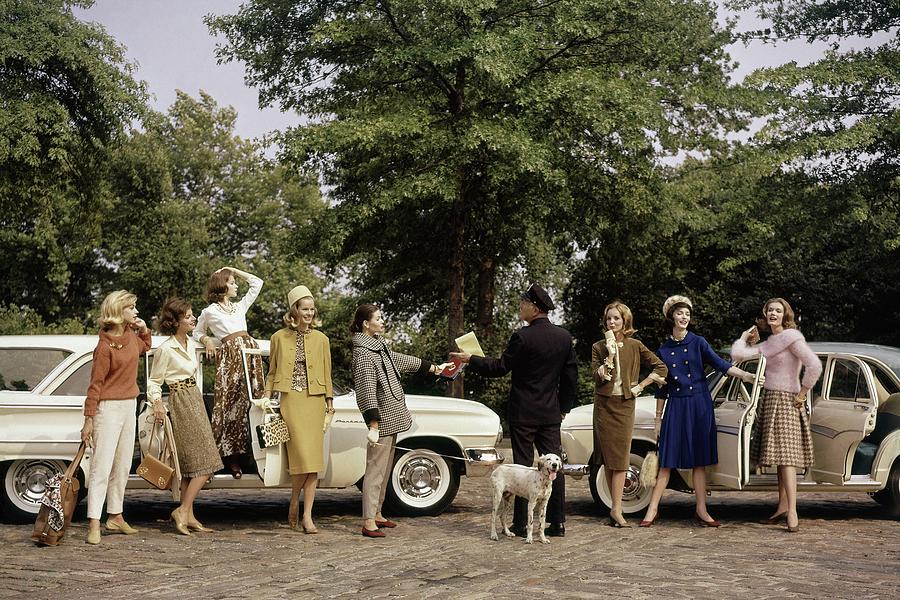 Group Of Models Posing In Front Of Cars Photograph by Frances McLaughlin-Gill