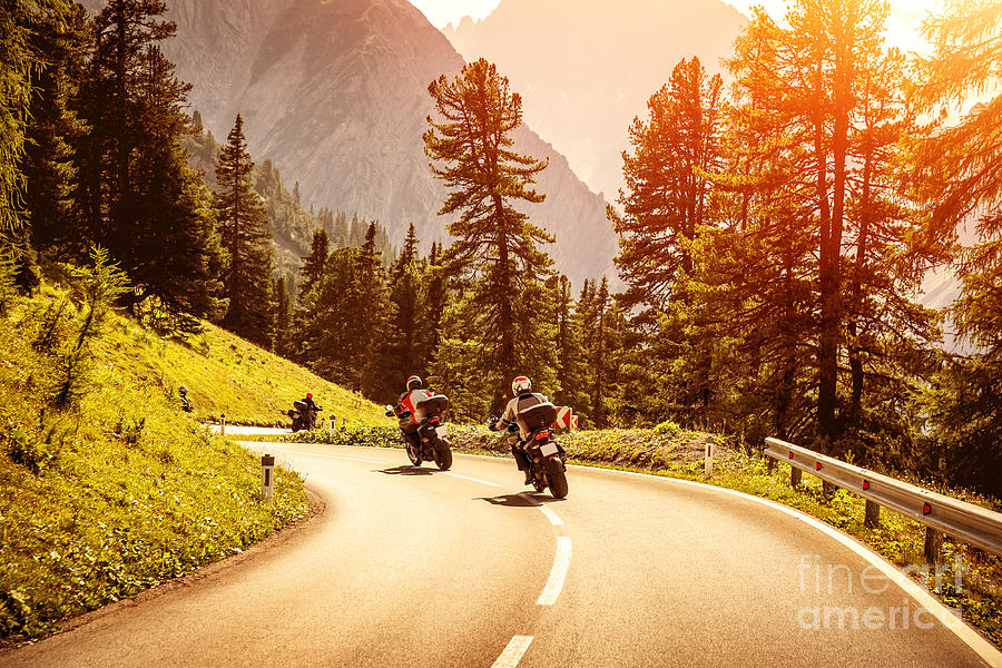 Group of motorcyclists on mountainous road Photograph by Anna Om