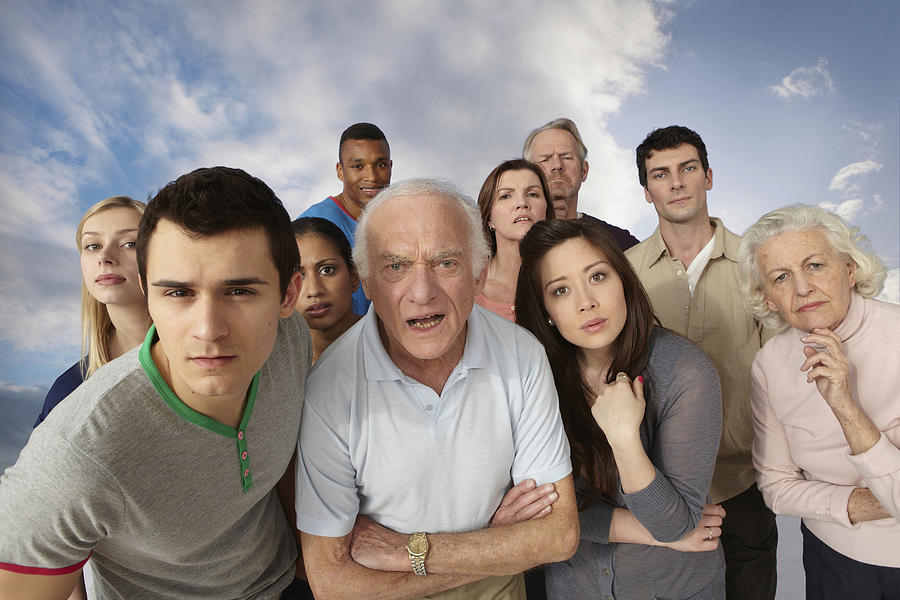 Group of people looking angrily at camera Photograph by Image Source