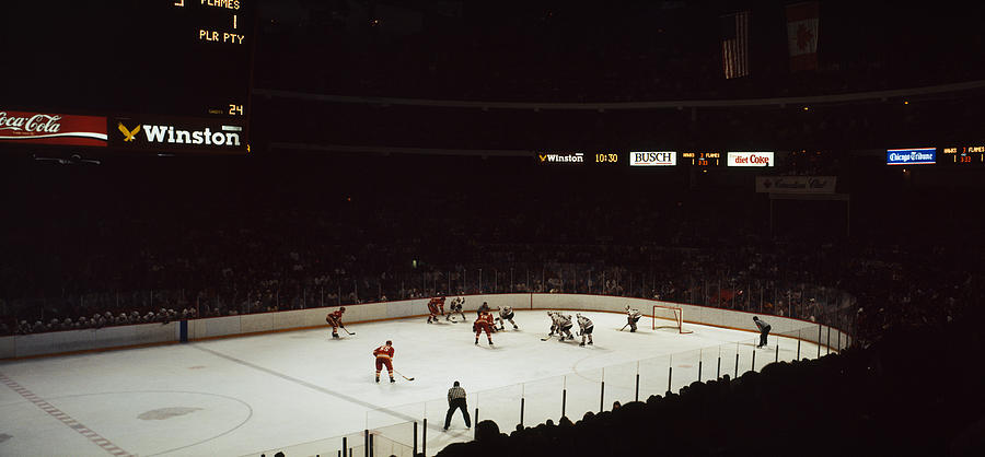 Group Of People Playing Ice Hockey Photograph by Panoramic Images