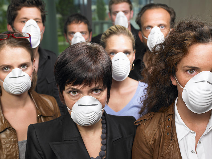 Group of people wearing protection masks Photograph by Ghislain & Marie David de Lossy