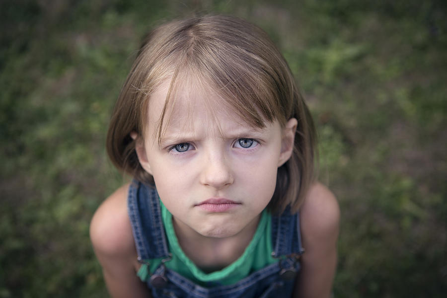 Grumpy child Photograph by Elva Etienne
