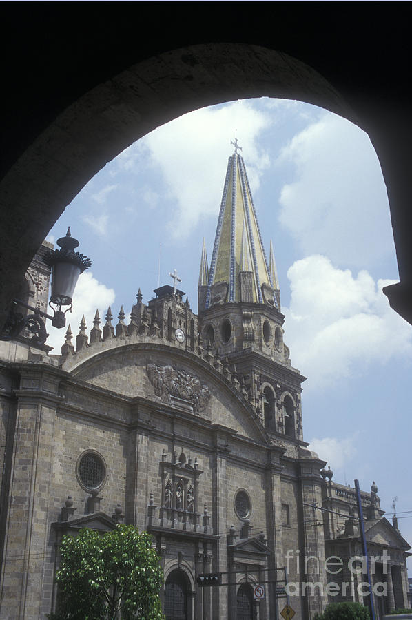 GUADALAJARA CATHEDRAL FRAMED BY ARCH Mexico Photograph by John  Mitchell