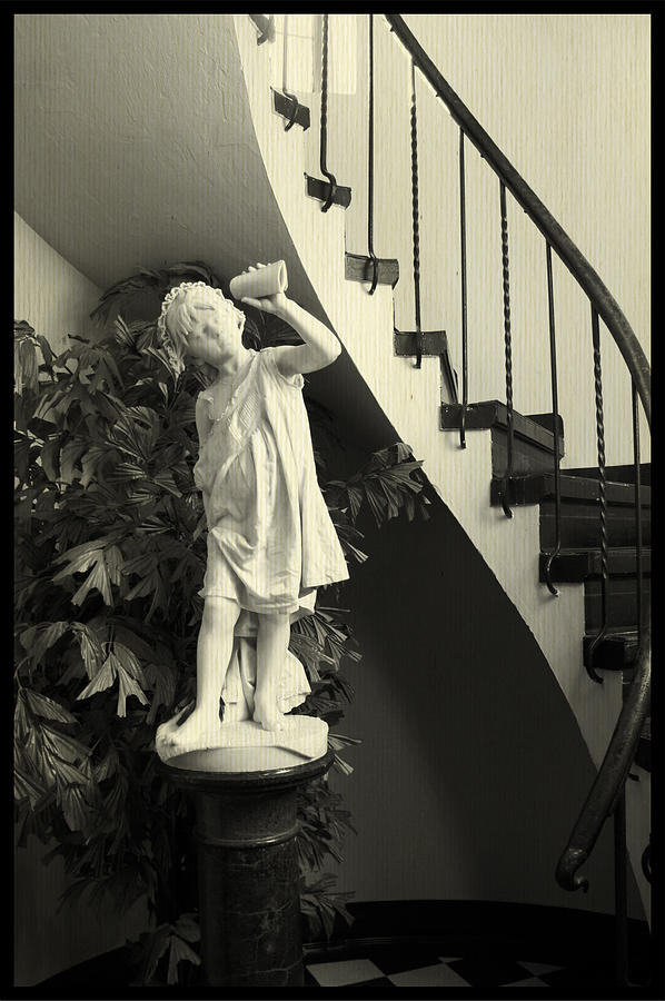 Black And White Photograph - Guardian of the Stairs by Laurie Perry