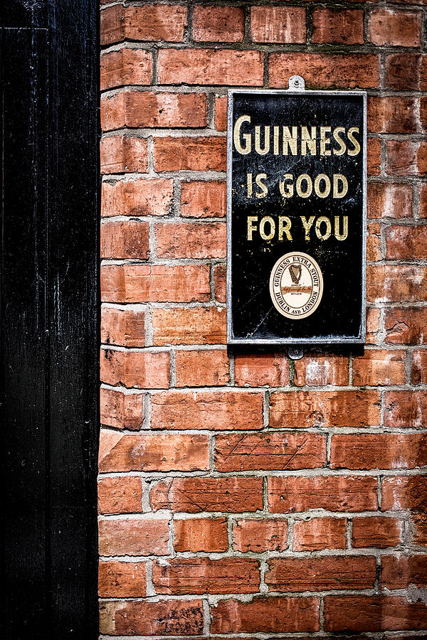 Guinness is good for you Photograph by Nigel R Bell
