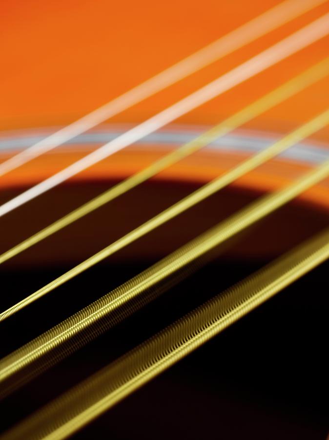 Music Photograph - Guitar Strings Vibrating by Science Photo Library