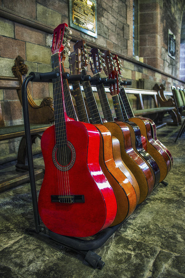 Guitars On A Rack Photograph by Ian Mitchell