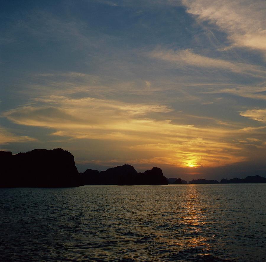 Halong Bay Sunset Photograph by Tbelarbi